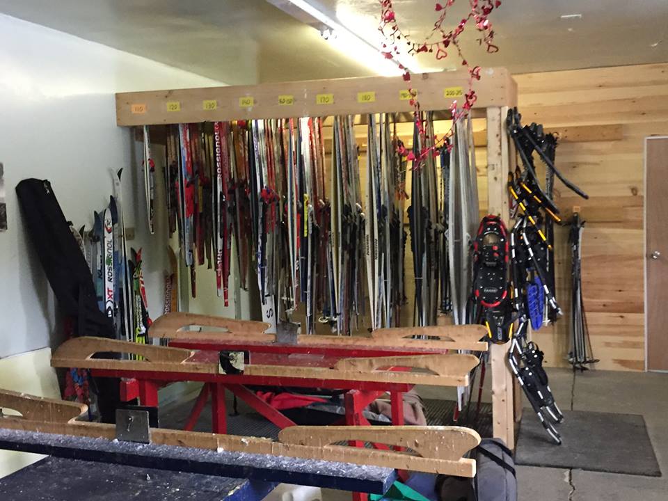 A view of rental ski's and waxing tables!